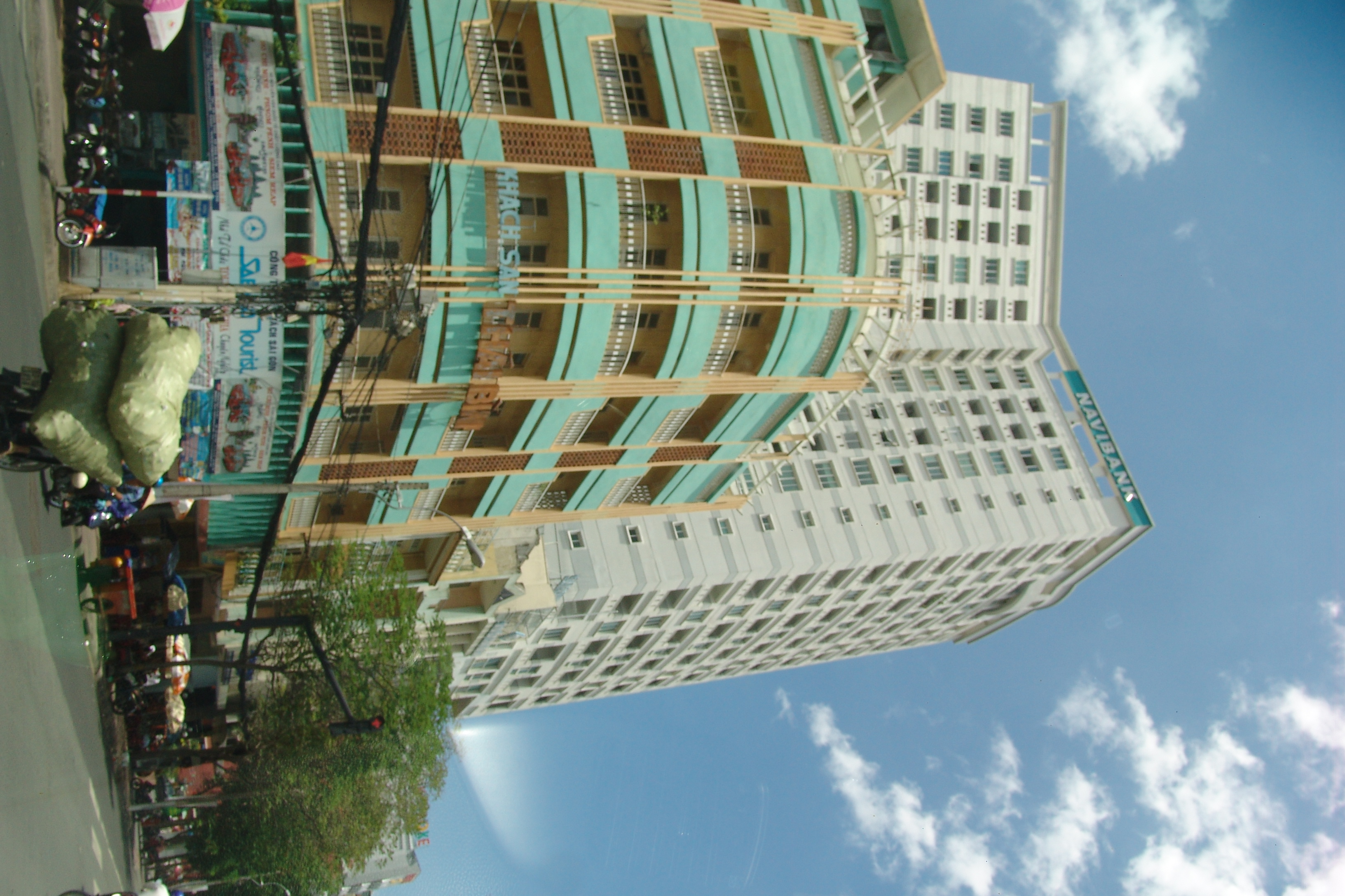 Express by M Village Phạm Ngũ Lão Hotel (formerly Thái Bình Hotel) with International Plaza Office & Residences Tower on corner of Đỗ Quang Đẩu and Phạm Ngũ Lão