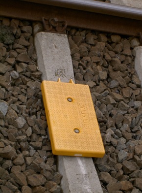 A Eurobalise that communicates ETCS positional information to passing trains