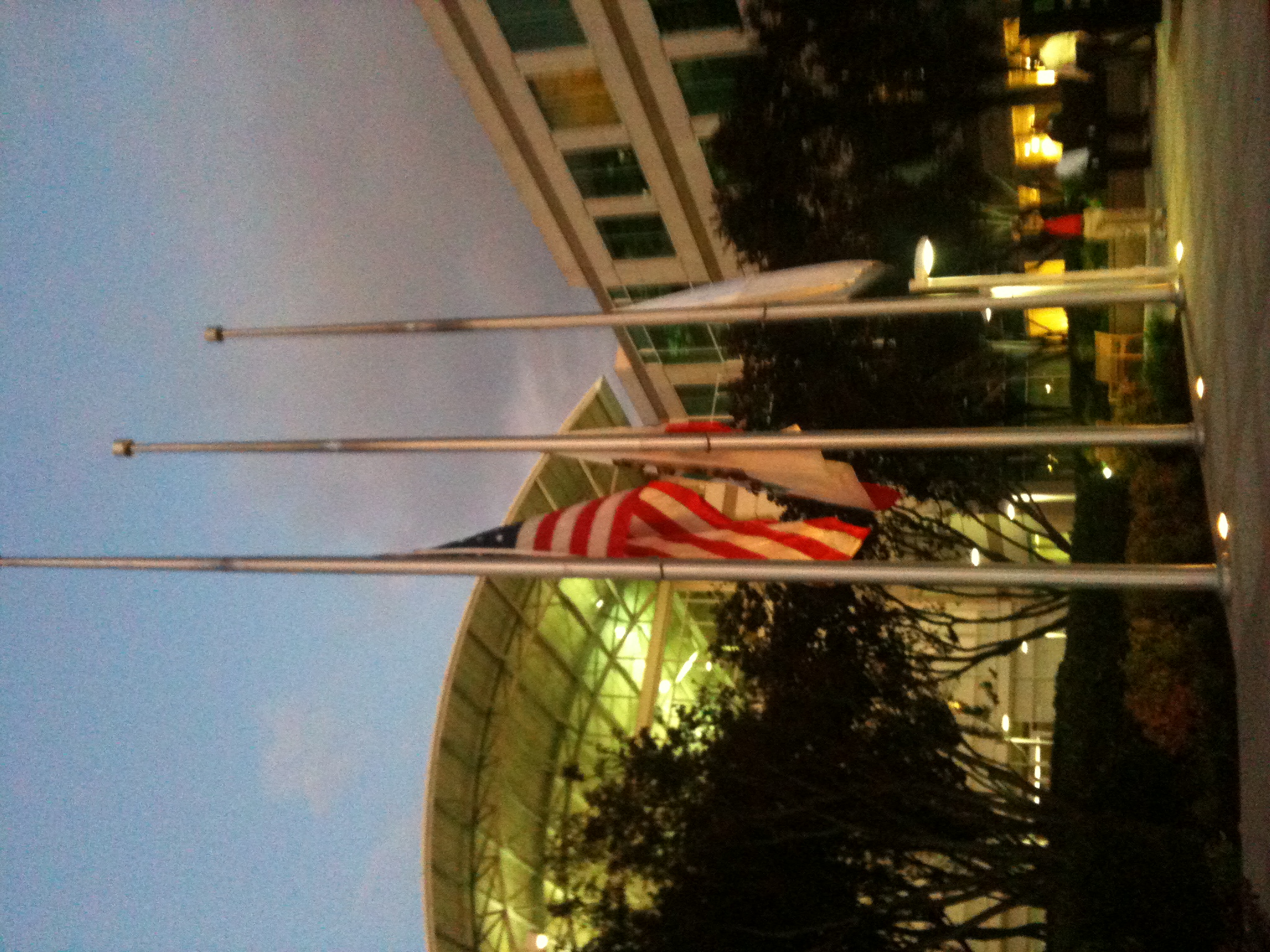 Flags flew at half-staff outside the Apple Infinite Loop campus on the evening of Jobs's death.