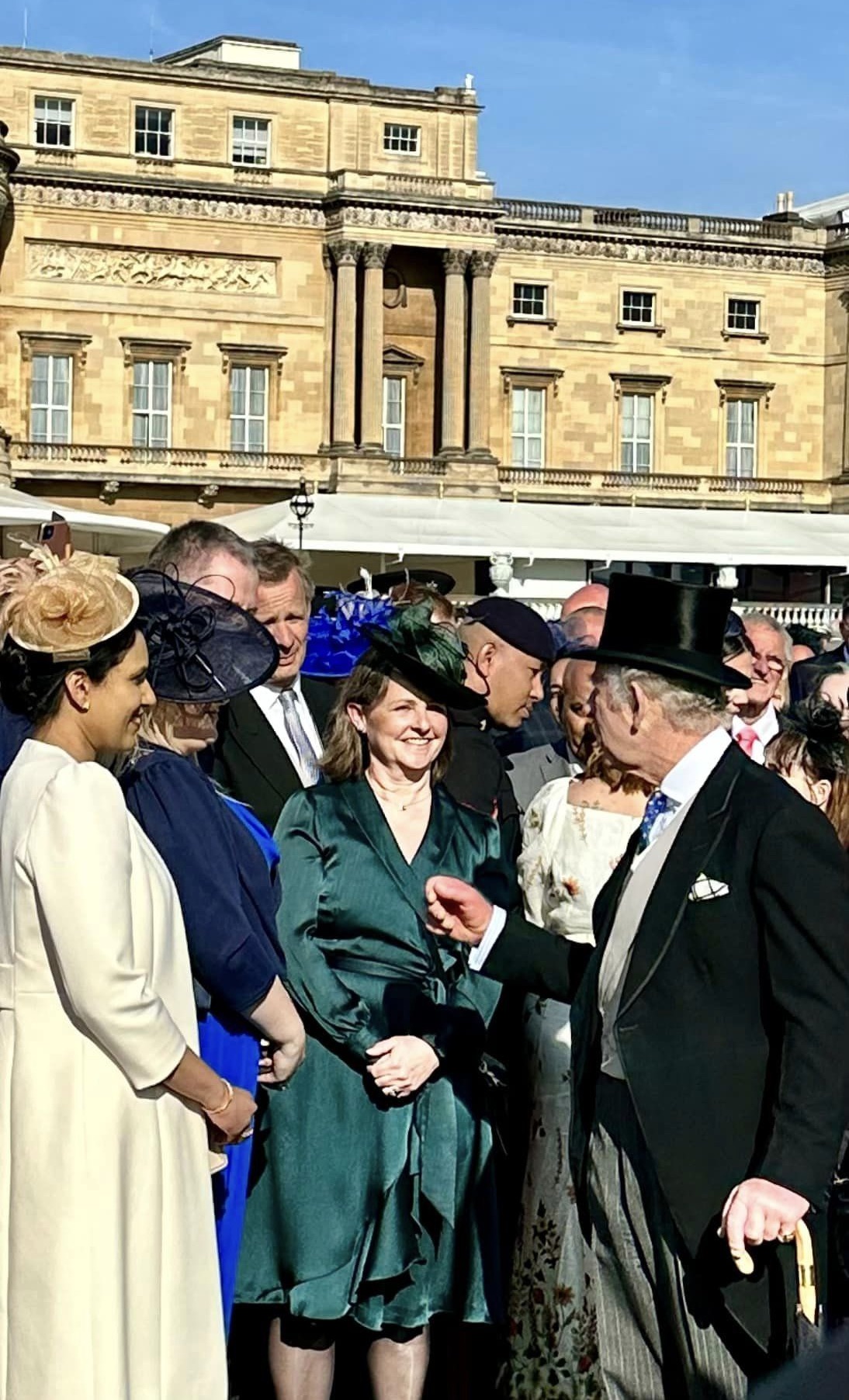 Dr Wijeyeratne with Charles III, King of the United Kingdom at Buckingham Palace, London