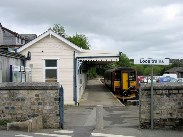 Liskeard railway station in the United Kingdom. This platform, for trains to Looe, is at right angles to the mainline platforms, which lie parallel to the wall in the foreground
