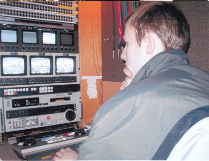 An SPNN volunteer operates the DPS replay deck from inside the SPNN production truck.