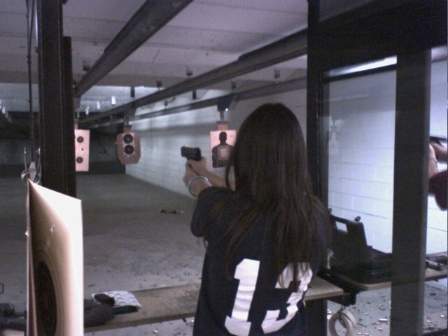 A shooter on an indoor range in Scottsdale, Arizona.