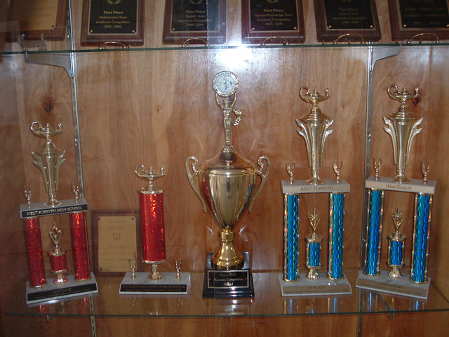 The Hanes Mall Cup (center) on display at West Forsyth High School.