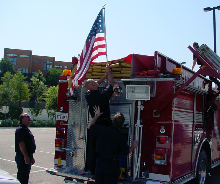 Firefighters Helping One Another