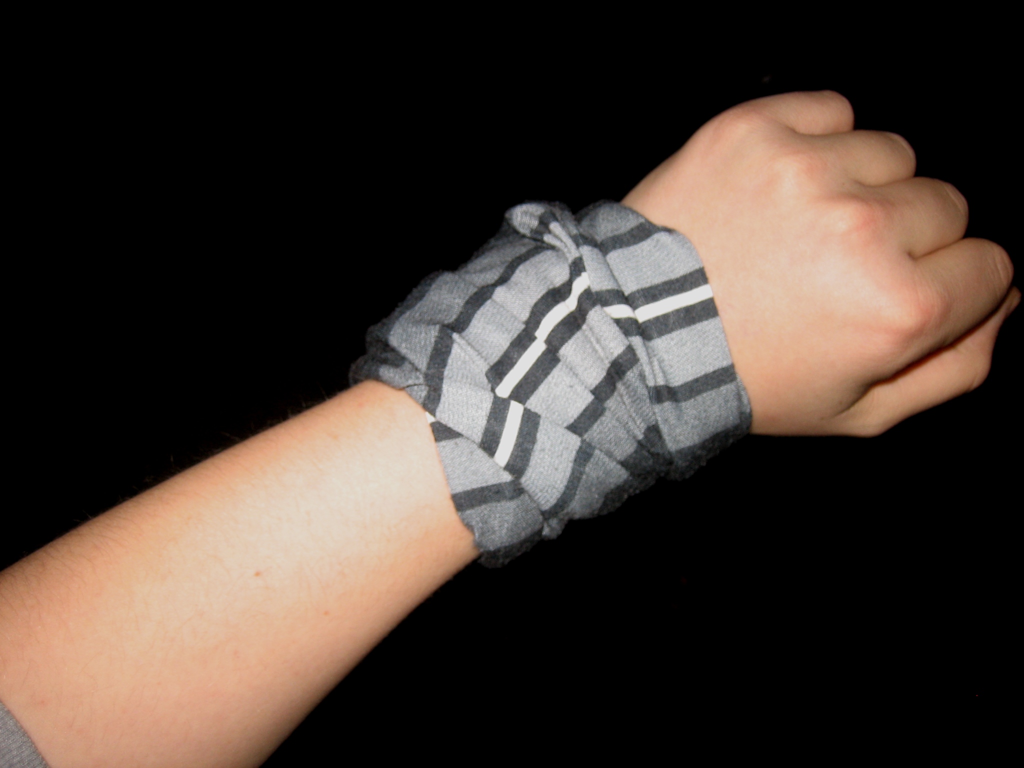 Buff worn as wristband
