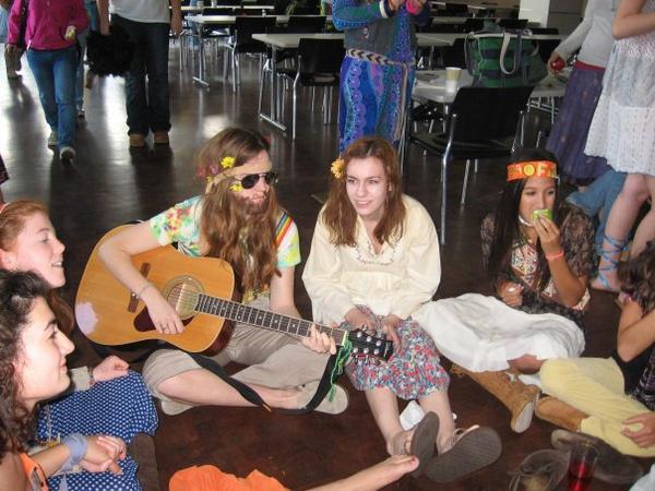 A casual hippie themed World Jump Day jam session in the Winsor cafeteria