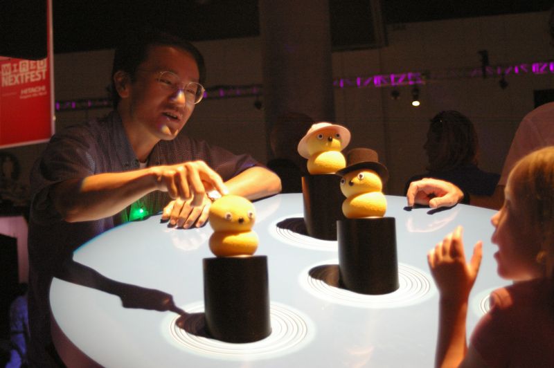 Hideki Kozima with a gaggle of Keepons at Wired's Nextfest 2007.