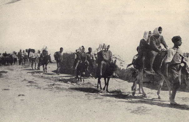 "In 1922-23 Near East Relief evacuated 22,000 children from ophanages in interior Turkey to Syria and Greece. These two pictures show part of the 5,000 children from Karput en route on donkey back and foot"