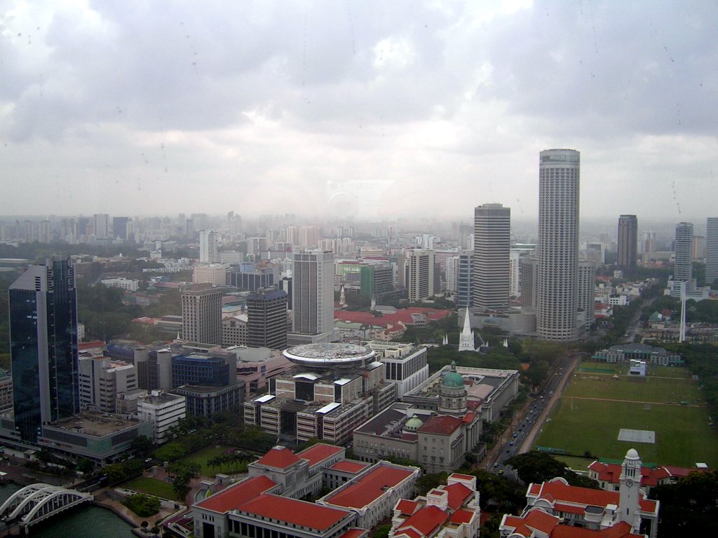 An aerial view of Singapore city centre, showing the Padang on the right.
