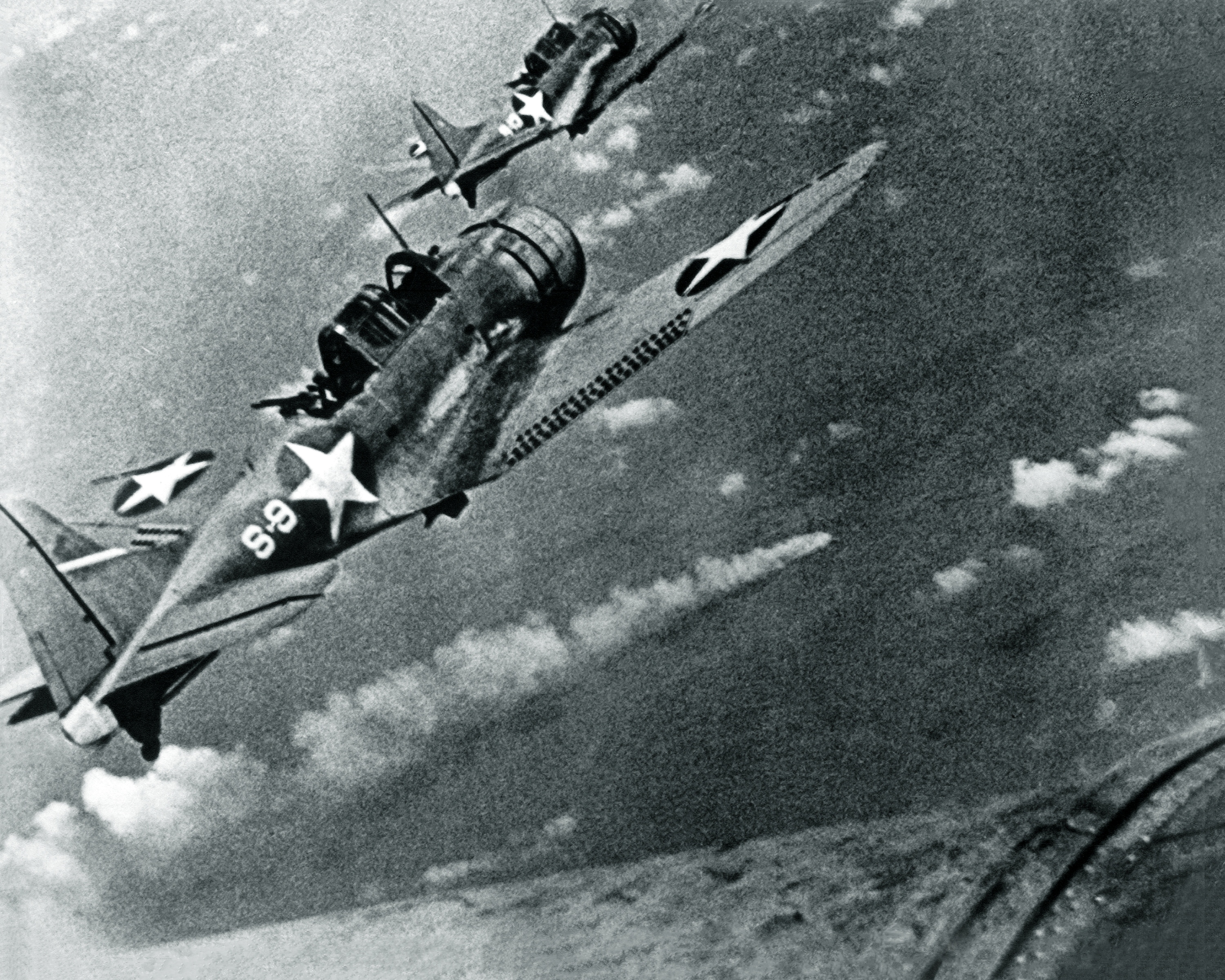 American aircraft attacking a Japanese cruiser at Midway