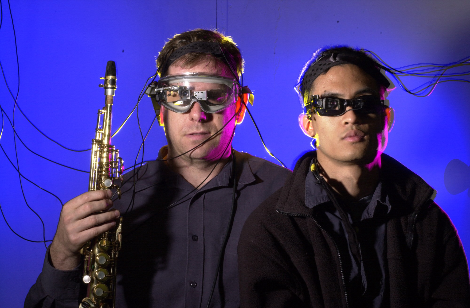 James Fung (right) during musical performance with brain-machine interface