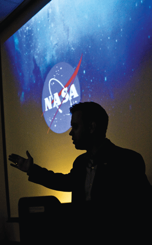 Josh Byerly delivers a presentation to students at Texas A&M University.