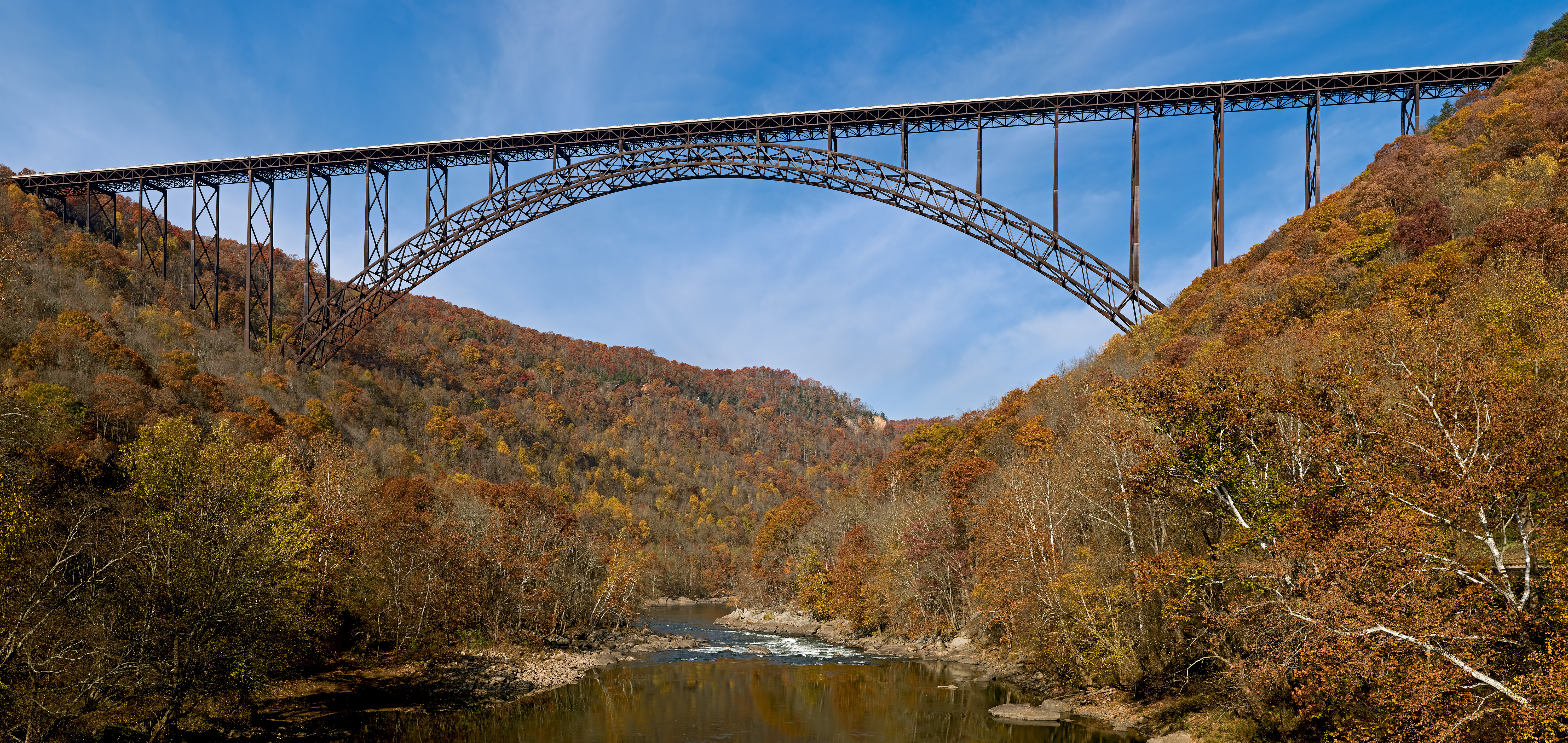 New River Gorge Bridge has the longest free span of all deck arch bridges: 518 m