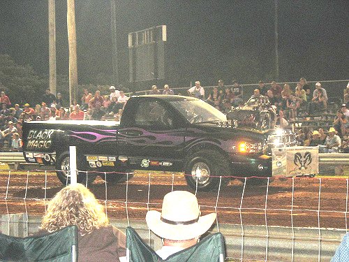 A Dodge four wheel drive pulling truck. A Dodge four wheel drive pulling truck.