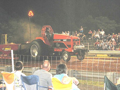 An alcohol-powered AGCO Allis pulling tractor. An alcohol-powered AGCO Allis pulling tractor.