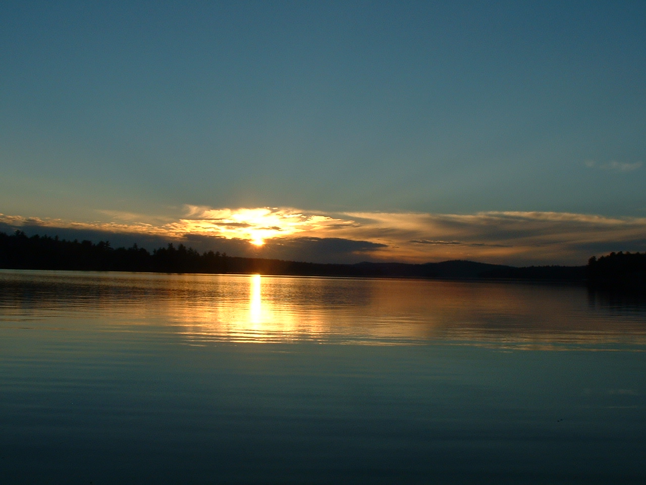A view of sunrise from the Main Dock at Camp Lawrence.