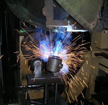 250|2|A Robotic Welder at the Hyco Ultrametal plant in Kitchener, Ontario