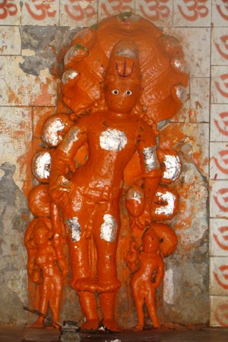 Statue of Taxaka at Taxakeshwar temple