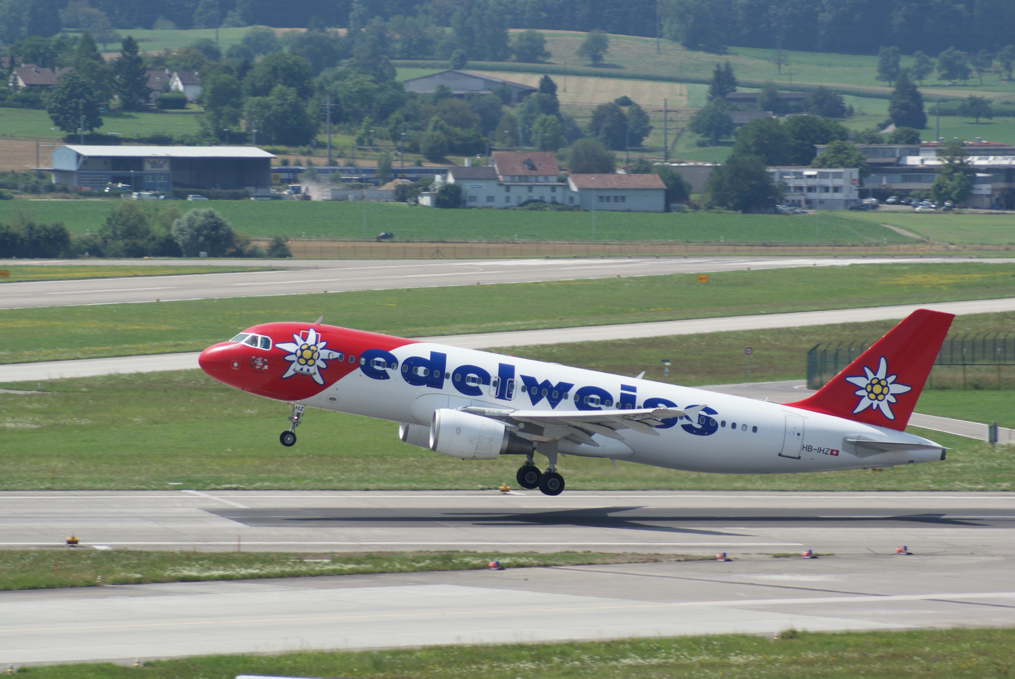 An Edelweiss Air Airbus A320-214 takes off from Zürich Airport, Switzerland. (2008)
