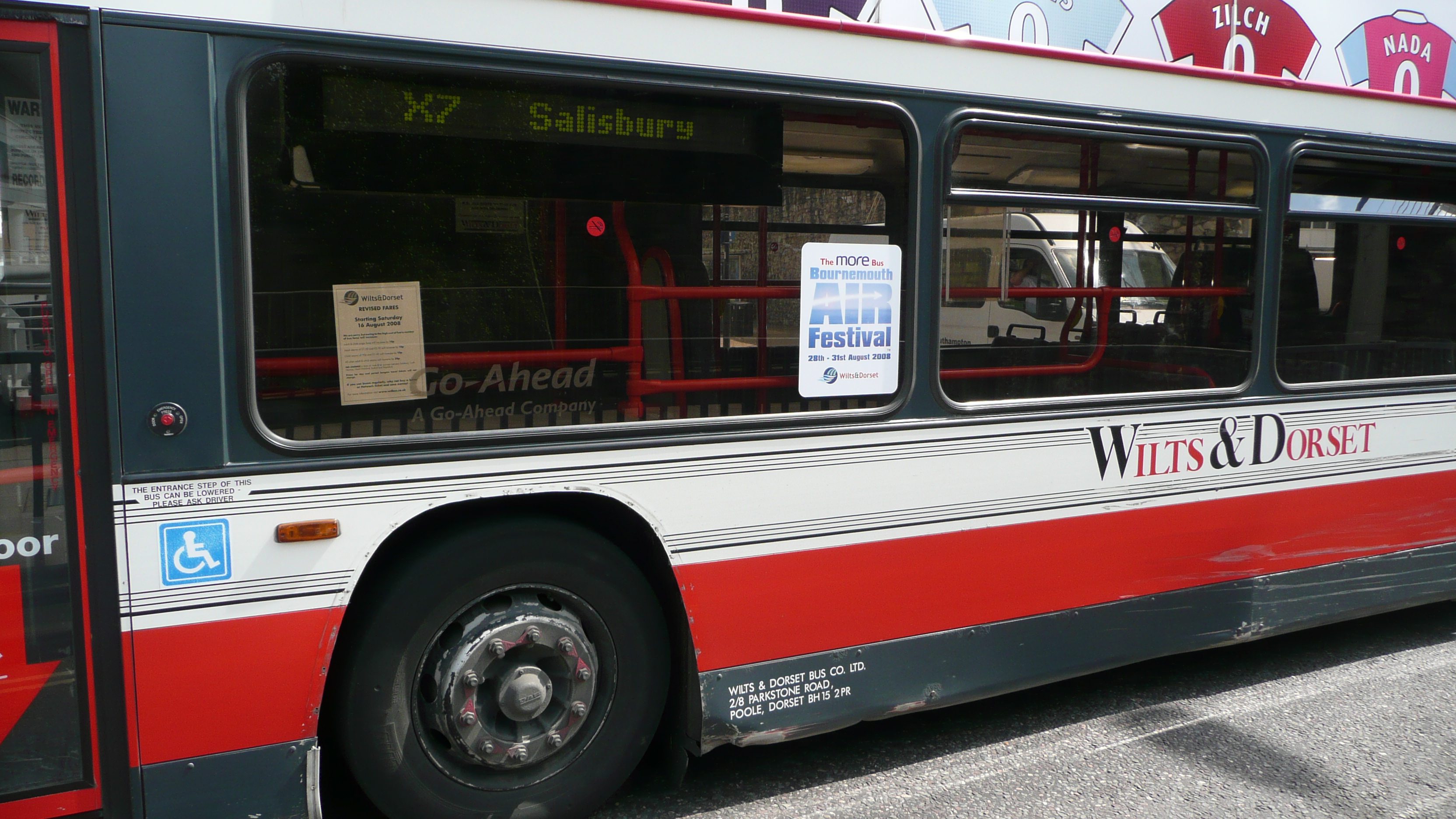 A Wilts & Dorset bus with one of the stickers advertising the Airshow on its side.
