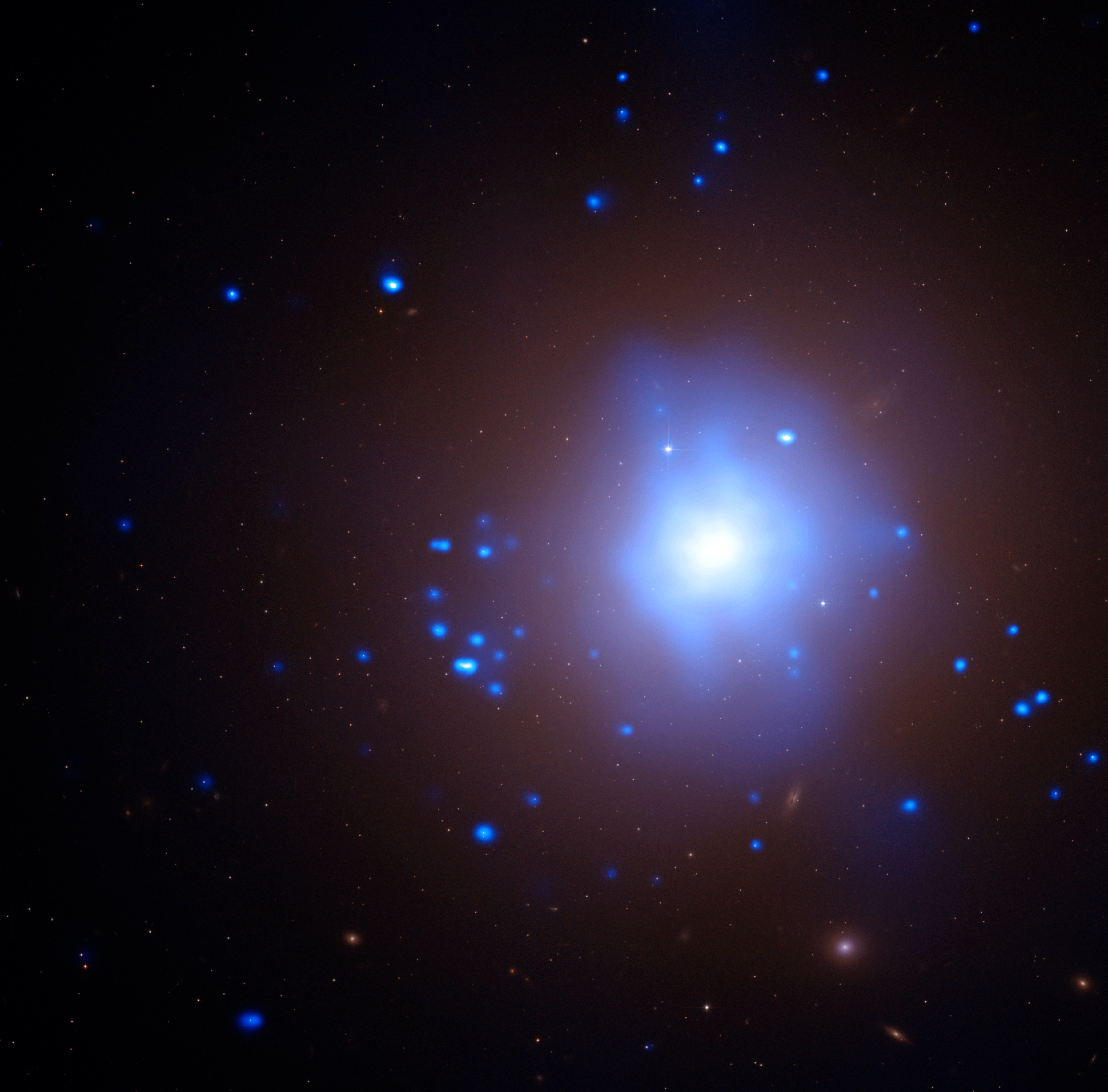  In this image, X-rays from Chandra X-ray Observatory are shown in blue and are overlaid on an optical image from the Hubble Space Telescope. The Chandra observations show that this object is an ultraluminous X-ray source (ULX). Credit: X-ray: NASA/CXC/UA/J. Irwin et al; Optical: NASA/STScI ----