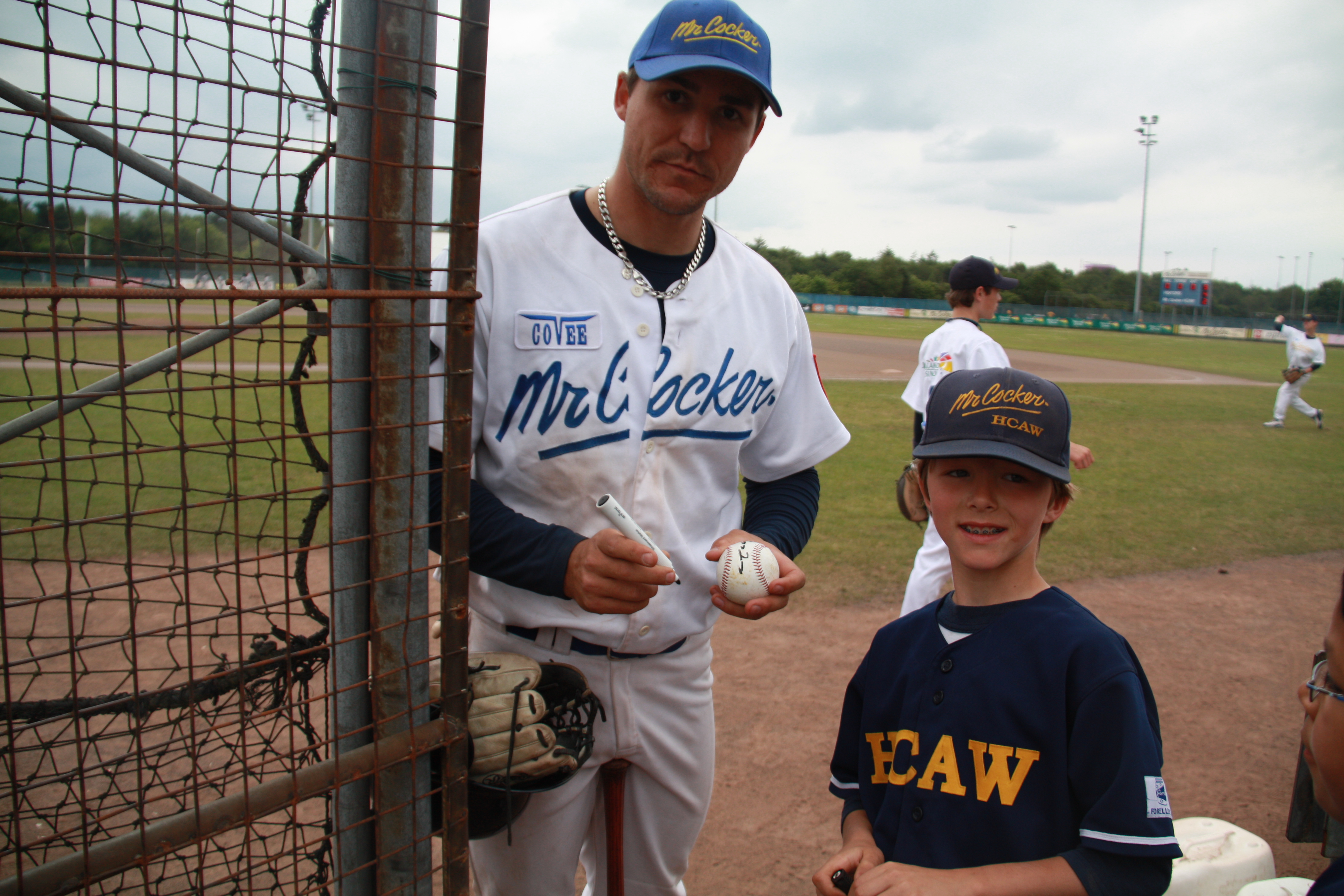 Rees signing first home run ball