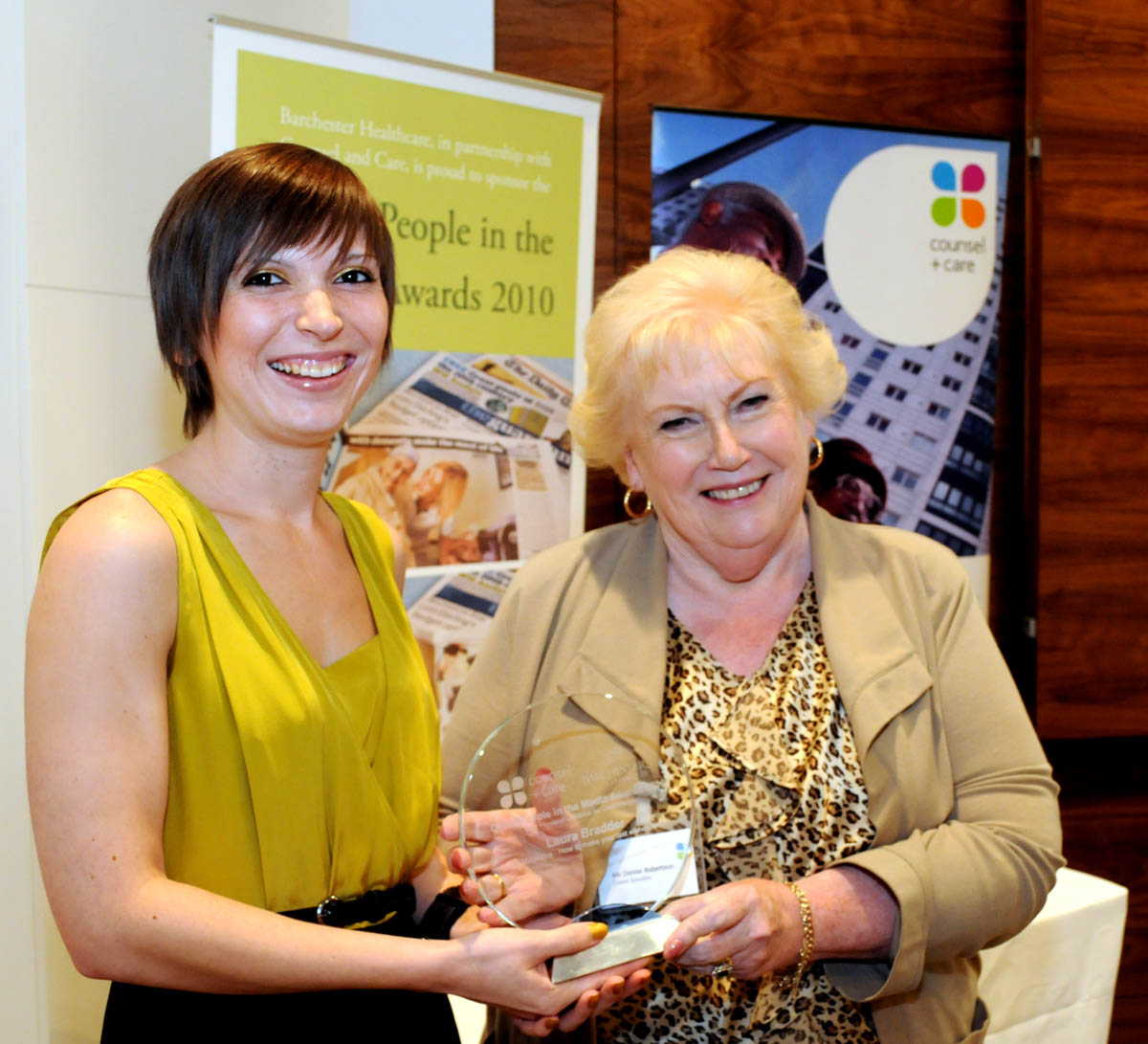 Laura Bradder winning the award for 'Best Portrayal of Support for Older People 2010'.
