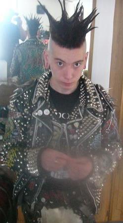 A "punk rocker" style of studded leather jacket & vest.