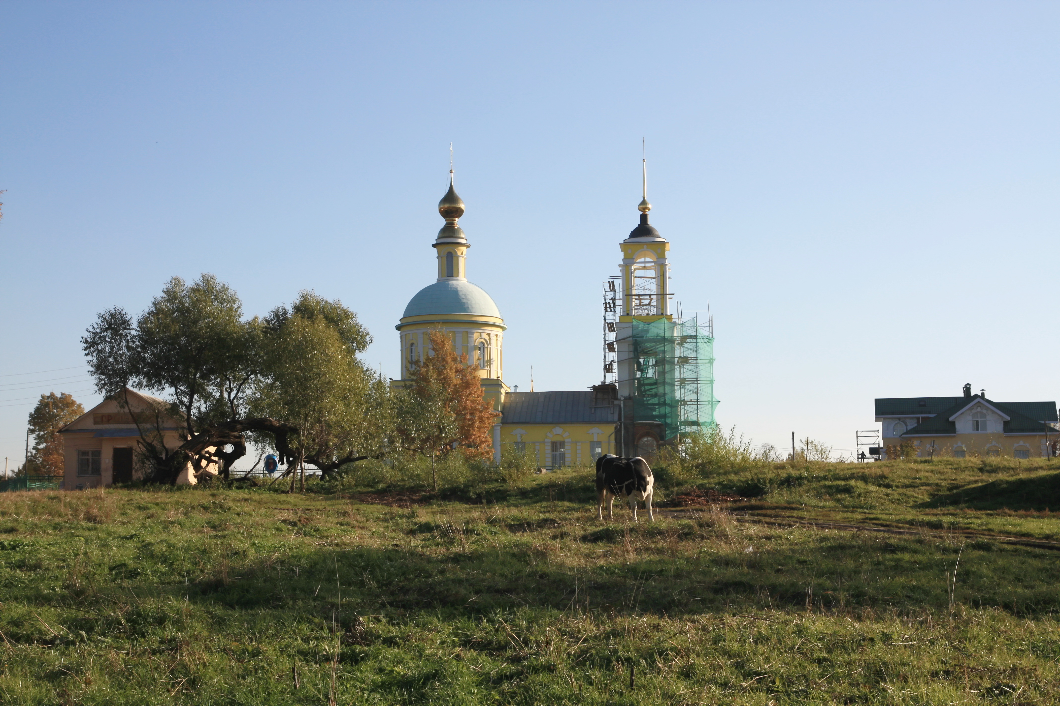 View at the St. Nicholas church from Buzhaninovo's village green 
