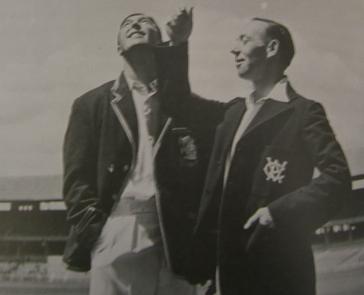 Denis Compton and Lindsay Hassett tossing the coin