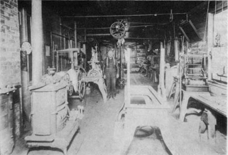 Nels Johnson in his clock shop circa 1895