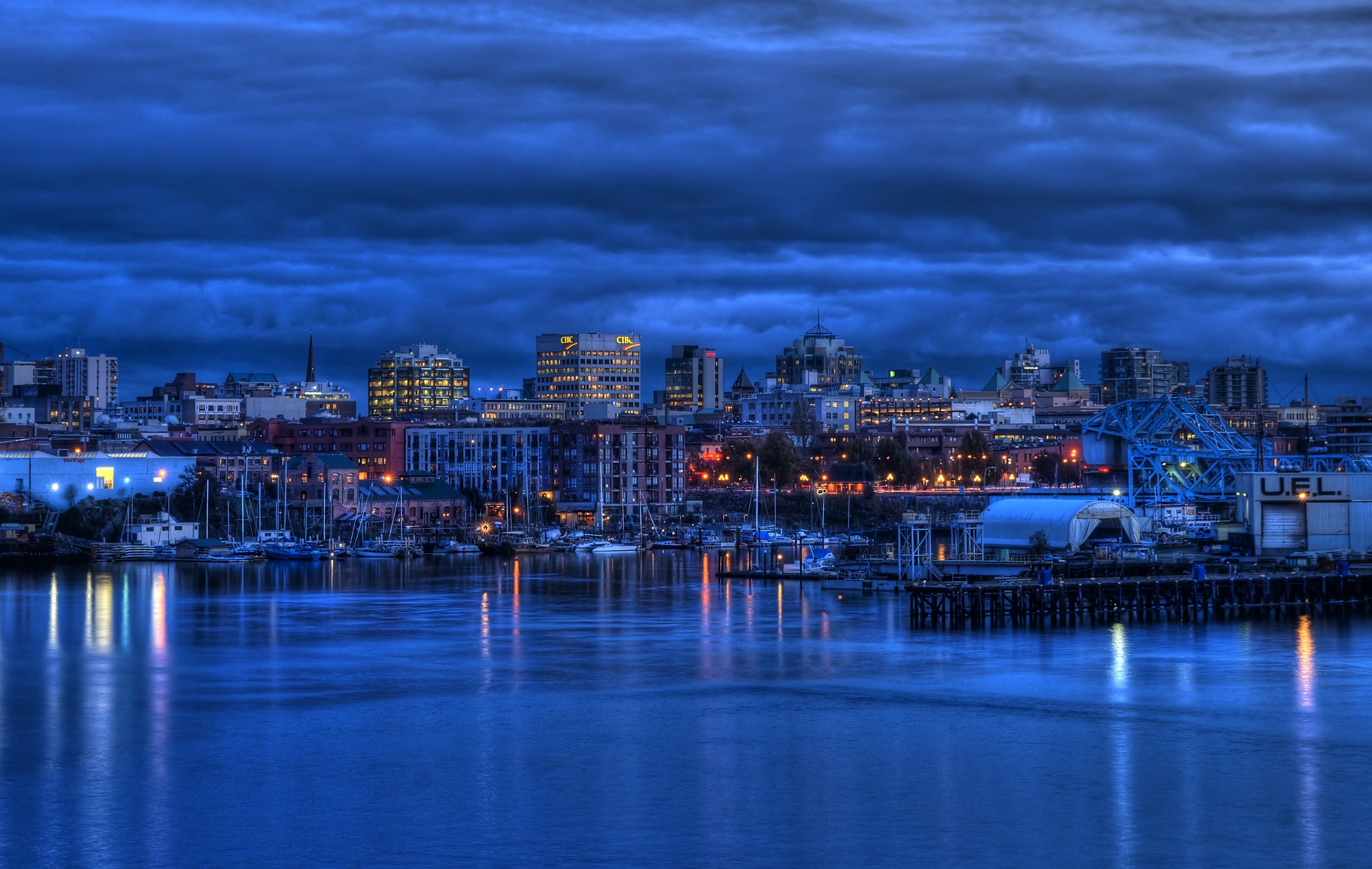 The inner harbour with the Victoria skyline, at night.