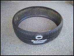 A Mechanical Concrete tire-derived cylinder