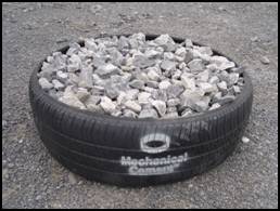 A Mechanical Concrete cell: a tire-derived cylinder filled with aggregate