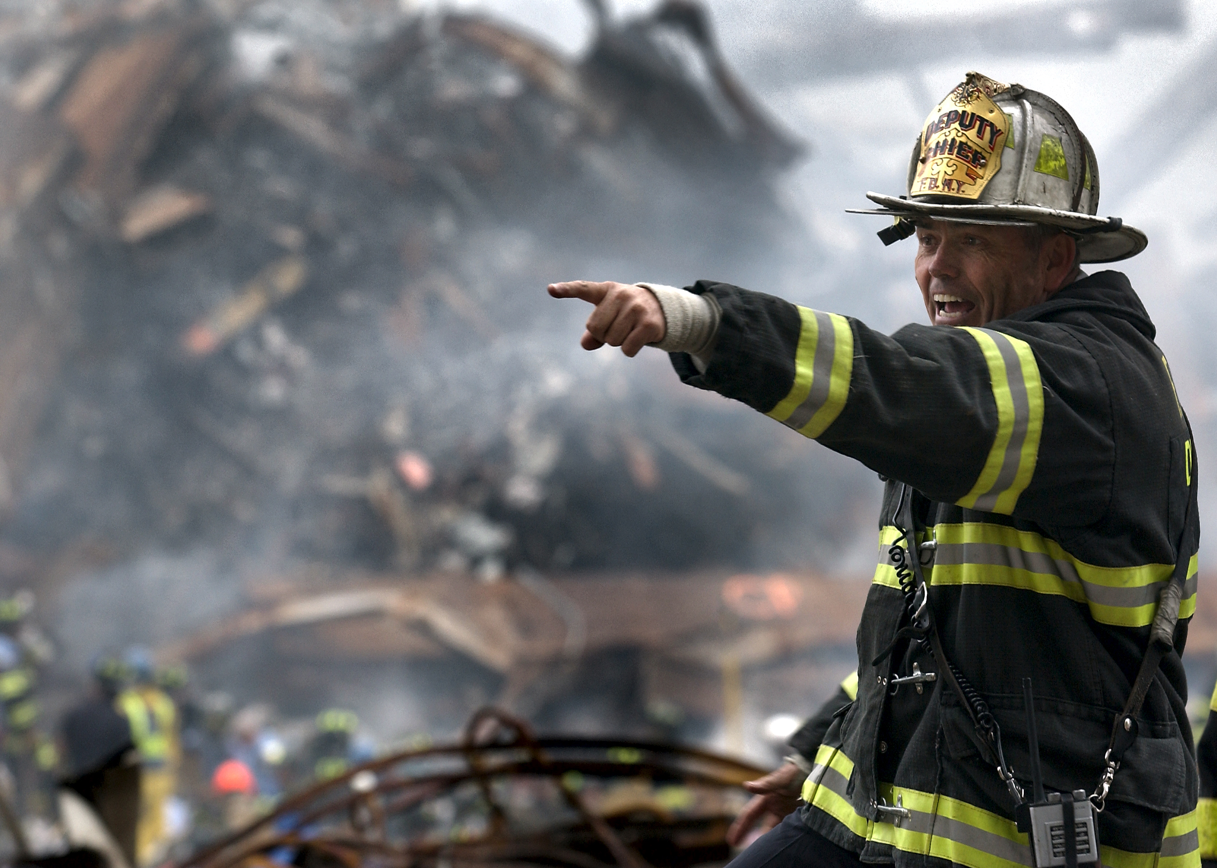 A deputy chief coordinates recovery efforts three days after the collapse of the World Trade Center.