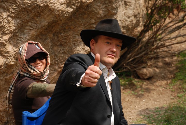 On the 2010 movie set of the Tibetan Bodyguard 藏客 with his wife and college Helen Du by his side. On the 2010 movie set of the Tibetan Bodyguard 藏客 with his wife and college Helen Du by his side.