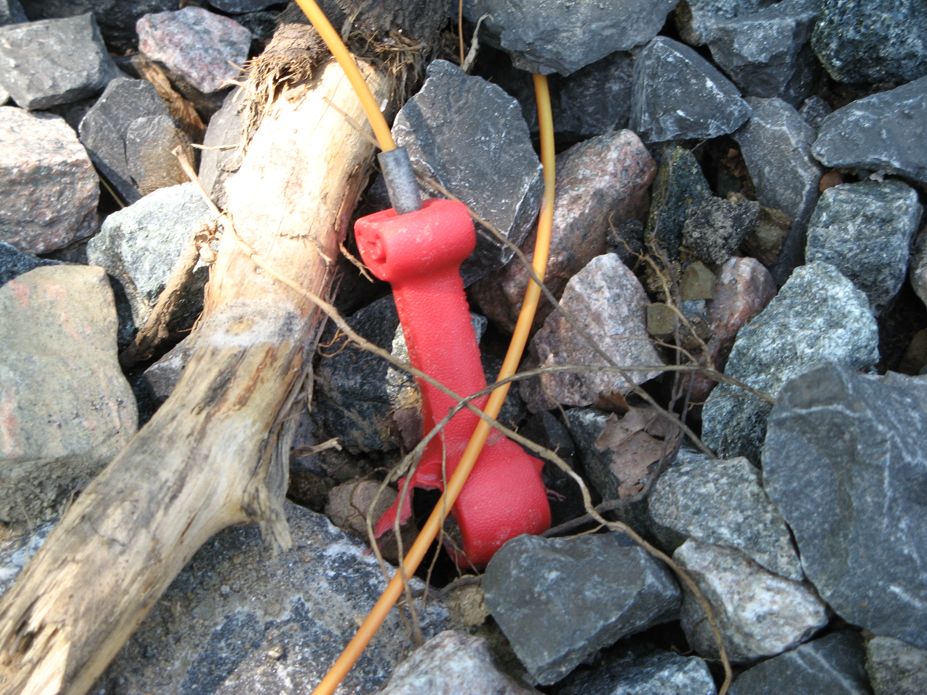  Blasting cap left by residential construction, Meech Lake shore, 2008|Explosives left on the Meech Lake shore illegally during construction, summer 2008.