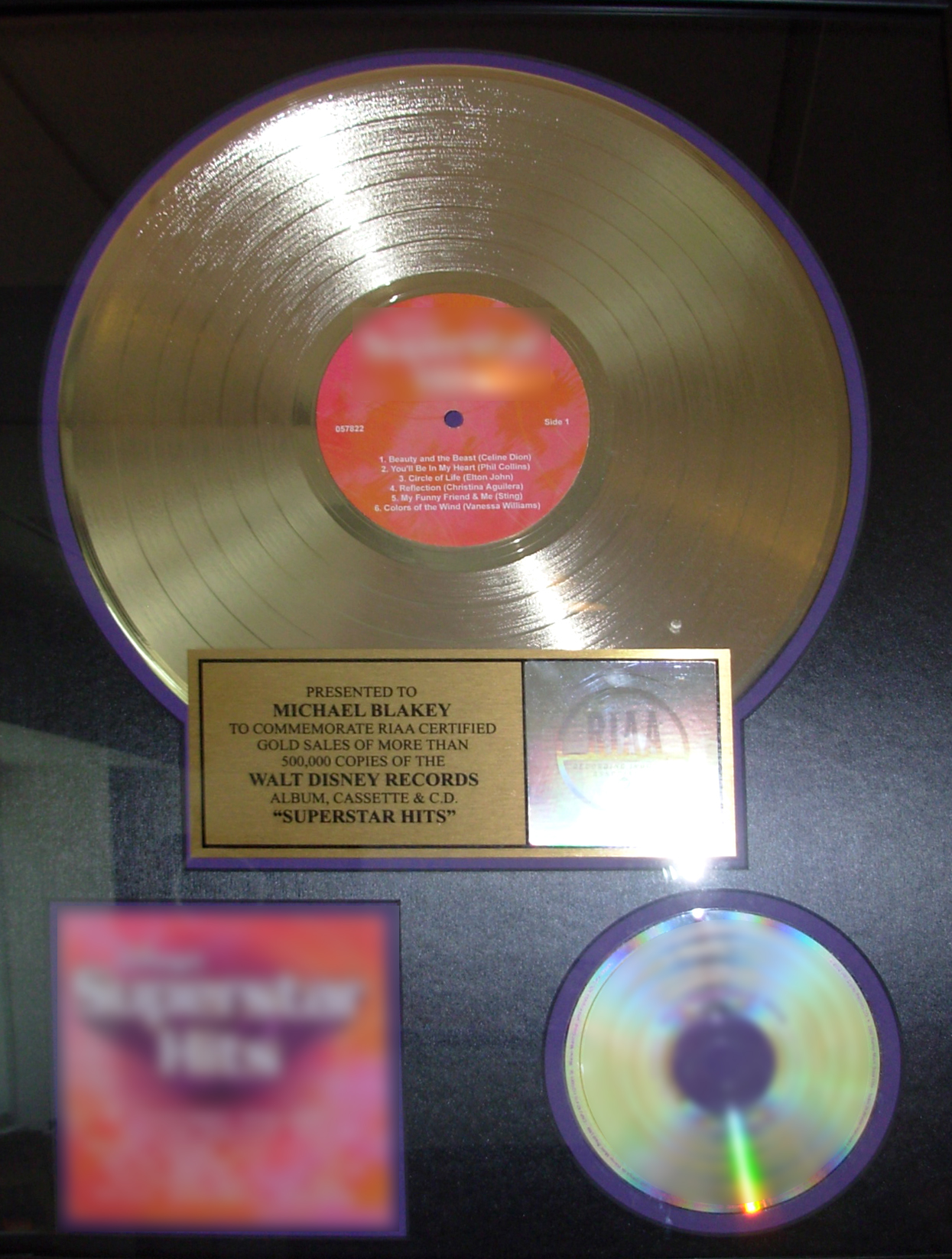 Disney's Super Hits gold record for Michael Blakey Disney's Super Hits gold record for Michael Blakey