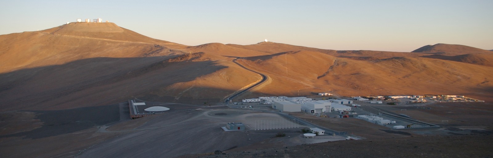 Marc Forster chose the Atacama Desert to represent Bond's vengefulness in the climax.|alt=A scientific facility in a desert
