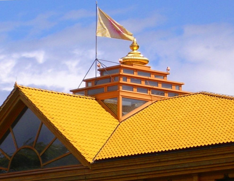 A kalash atop a Brahmasthan, with the flag of the Global Country of World Peace, on the Maharishi's HQ in Vlodrop.