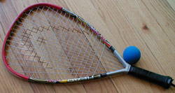 A typical racquetball racquet and ball