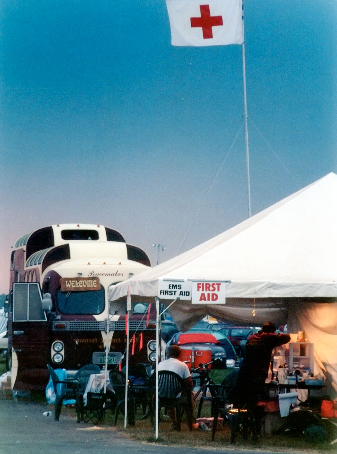 Peacemaker bus and first aid tent at Camp Oswego Phish concert