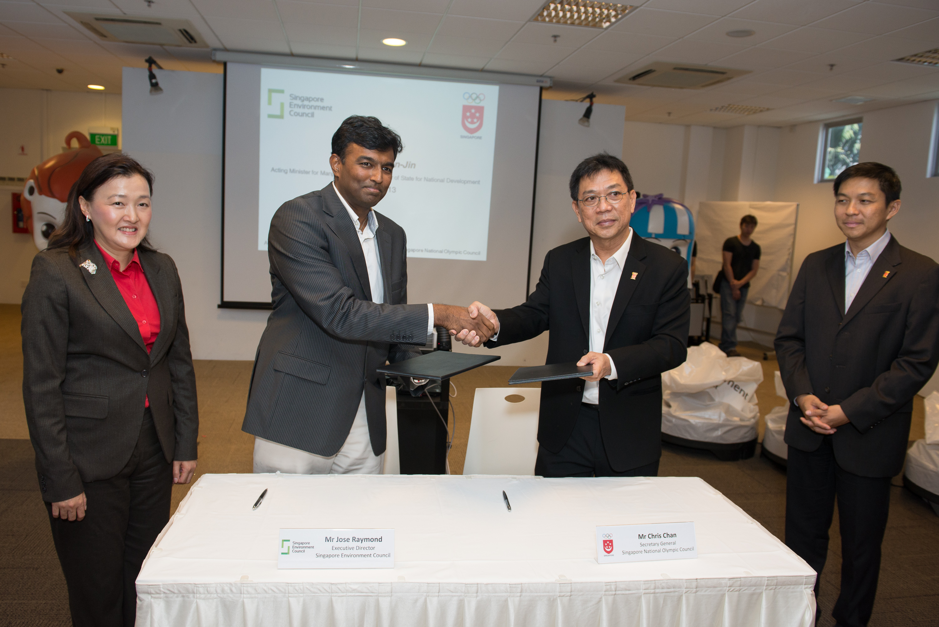 Executive Director of the Singapore Environment Council Jose Raymond and Secretary General of the Singapore National Olympic Council Chris Chan sign an MOU to co-create the Green Champions programme in Singapore.