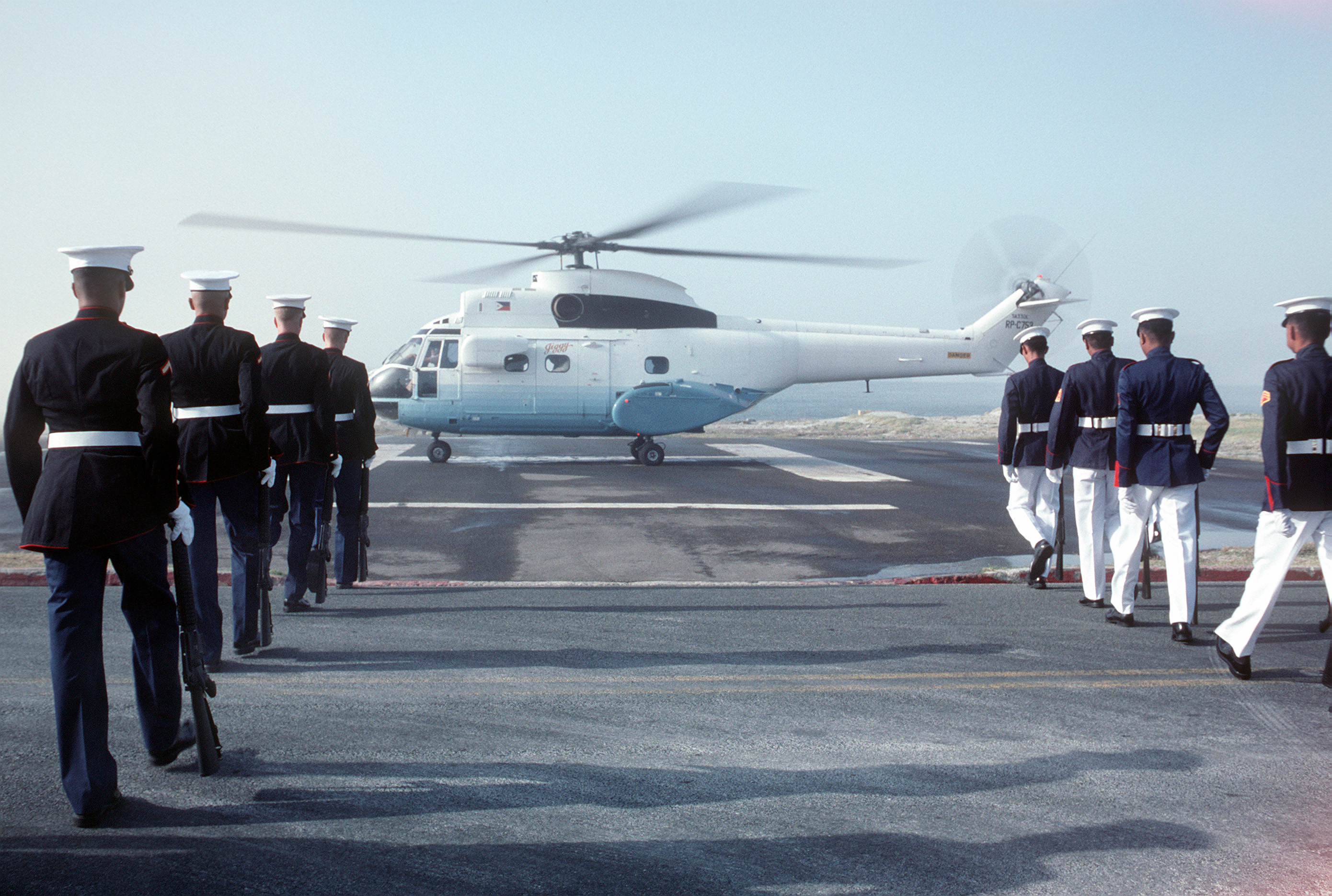 A former 250PAW SA-330 Puma helicopter lands in Subic Bay Naval Base.