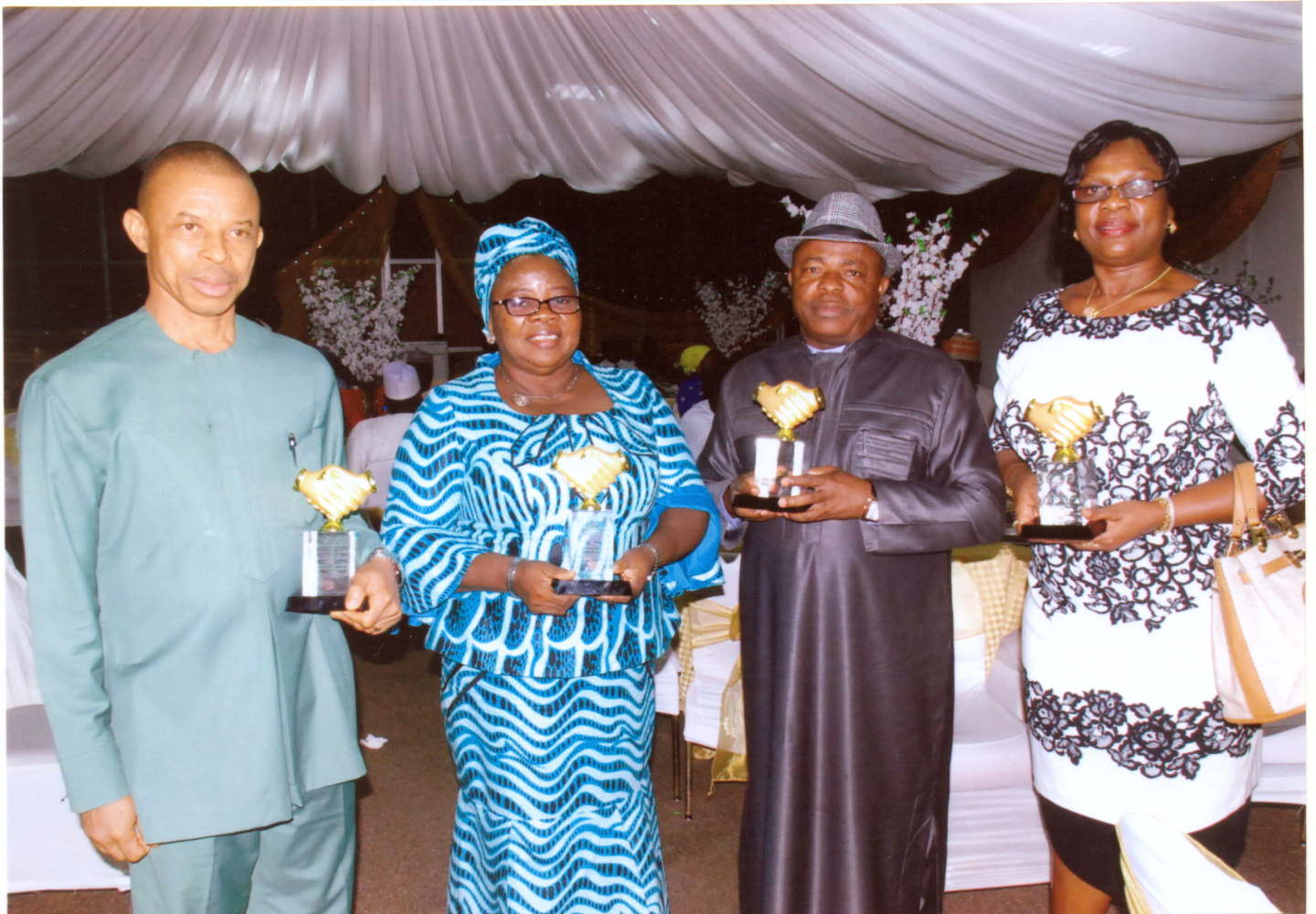 Dr. Ekong J. Effiong (left), with other recipients of the Outstanding Permanent Secretaries Merit Award by the House of Representatives (Nigeria), Committee on Governmental Affairs, 2014.