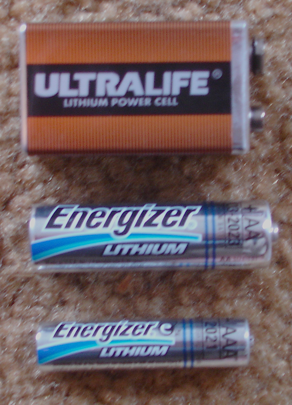 Lithium 9 volt, AA, & AAA sizes. The top unit has three lithium-manganese dioxide cells internally, the bottom two are lithium-iron disulfide single cells physically and electrically compatible with 1.5 volt zinc batteries.