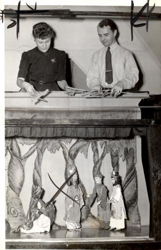 The Pauls manipulating their puppets in December 1949