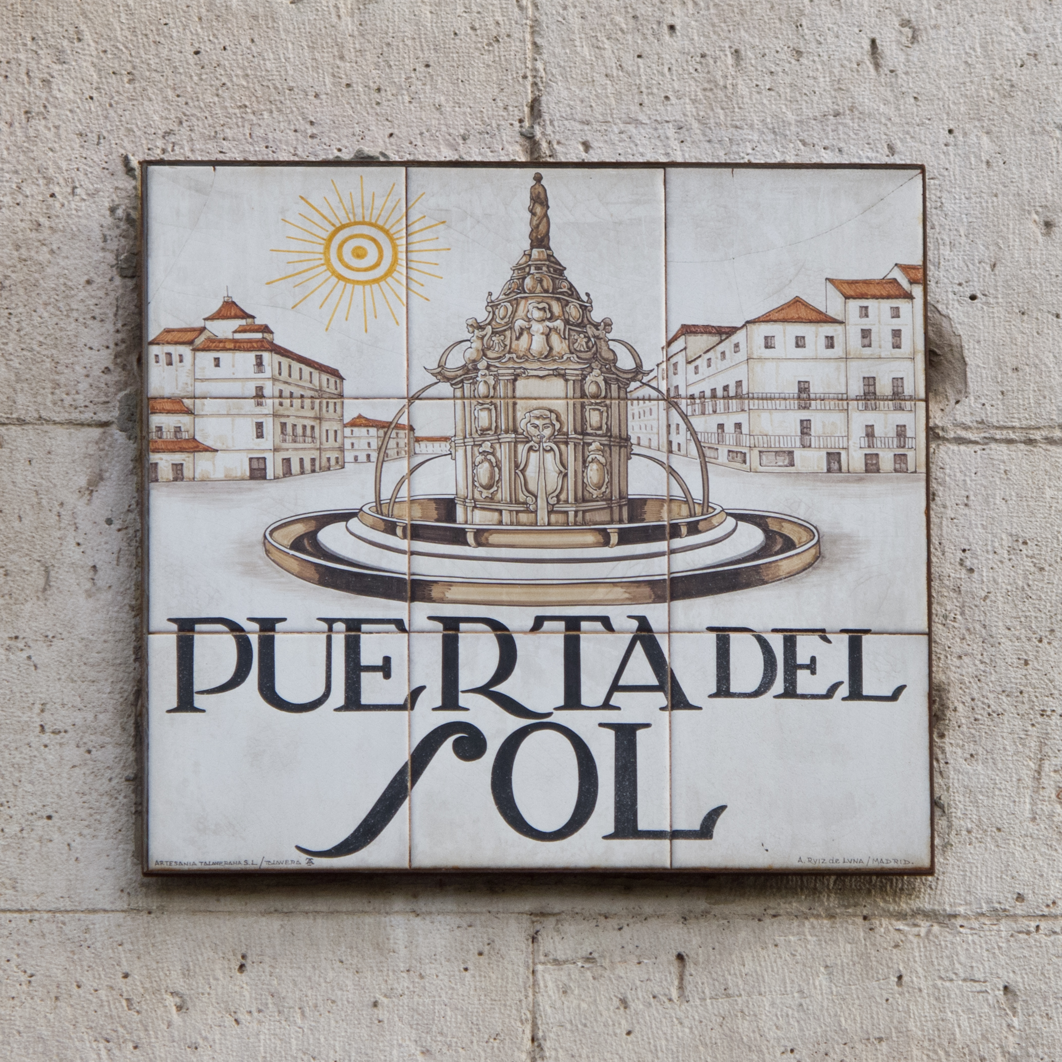 Azulejo street-sign in Puerta del Sol with a historic depiction of the fountain and the square at the time.