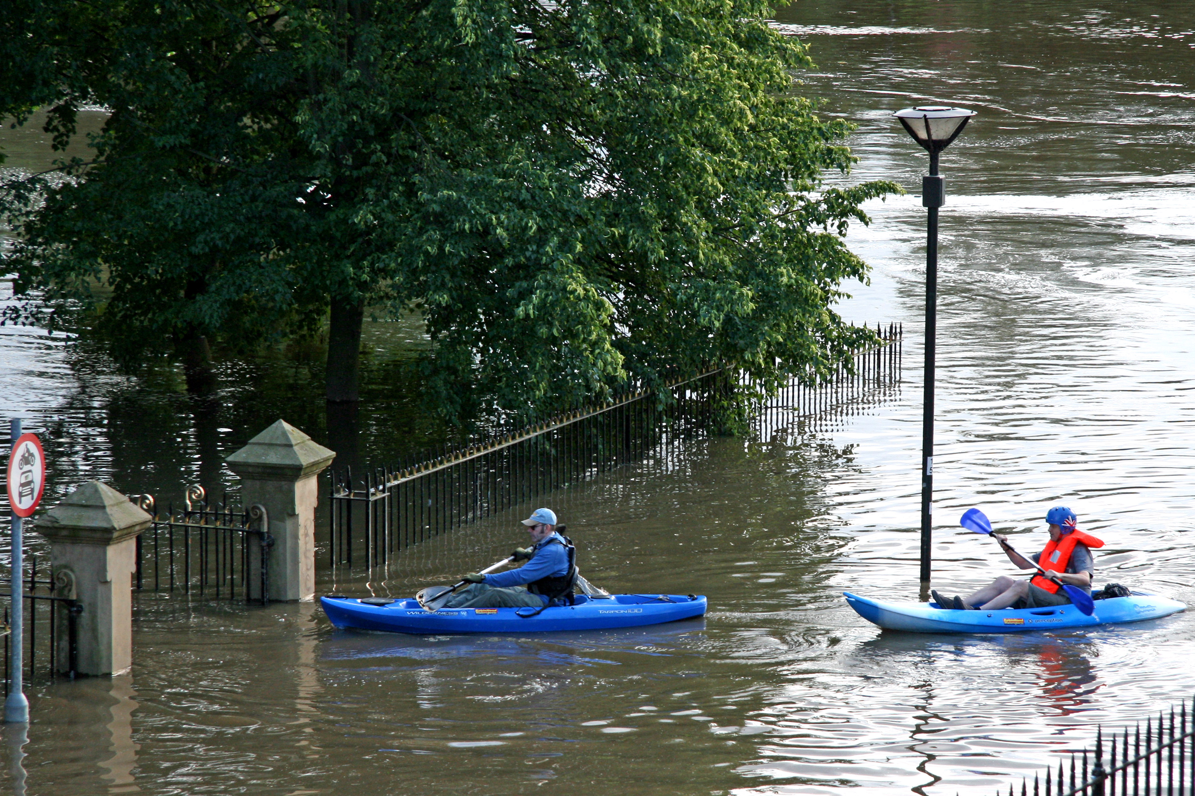 Two Kayakers make their way through a street in Yorkshire during the 2007 floods.